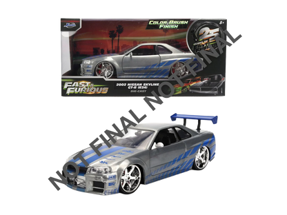 Voiture de collection Jada Nissan Skyline FAST & FURIOUS en modèle réduit 1:24, vue de côté, détails réalistes et design sportif.
