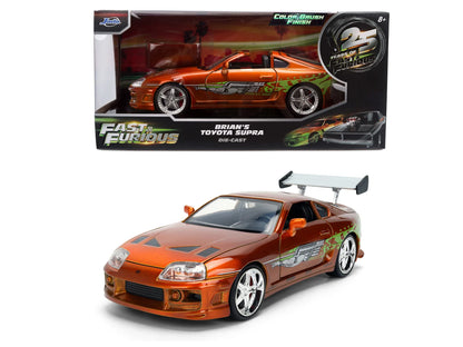 Voiture Jada Fast & Furious Toyota Supra anniversaire, modèle réduit 1:24, vue de face avec détails colorés et logo.
