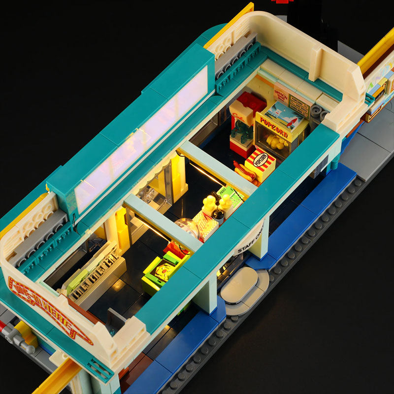 Diorama lumineux à construire Lumibricks Road Trip 18004 Night Glow Drive-In en briques de construction