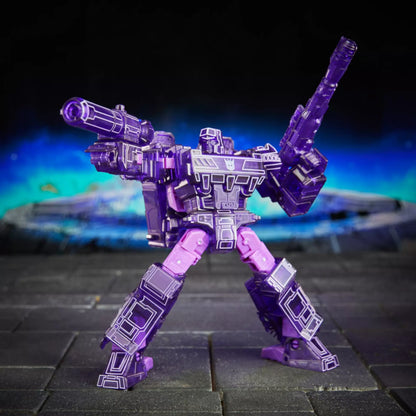 Figurine Megatron Transformers Age of the Primes Dark Energon de Hasbro, mode voyageur, détail précis et articulation.