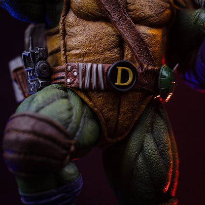 Figurine Donatello Tortues Ninja 1/10 Art Scale Iron Studios, statuette de 32 cm avec détails de la Tortue ninja.