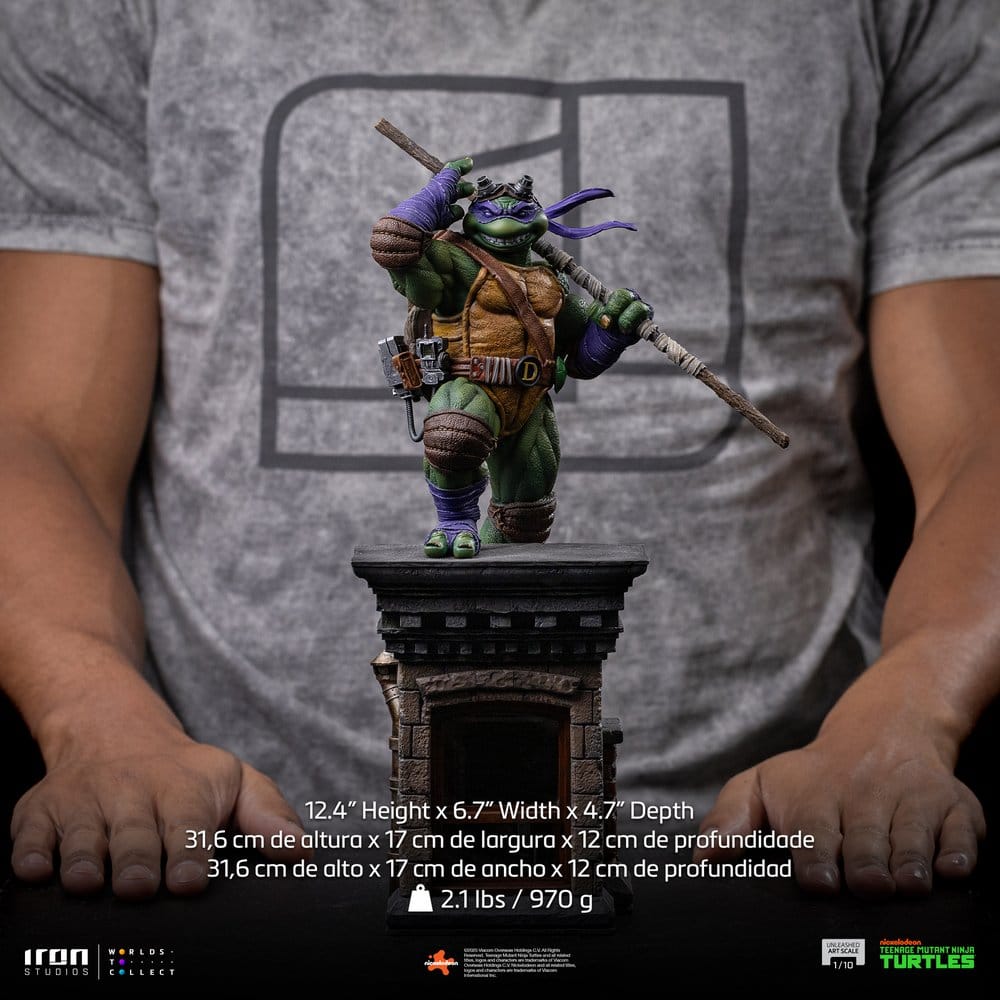 Figurine Donatello des Tortues Ninja, statuette Iron Studios 1/10 Art Scale, 32 cm, représentant le personnage en action.