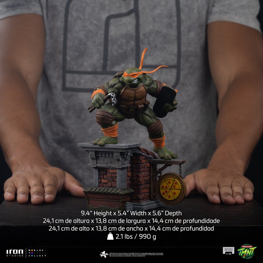 Statuette TMNT Michelangelo, Tortues Ninja, BDS Art Scale 1/10, Iron Studio, figurine détaillée de Michelangelo en pose dynamique.