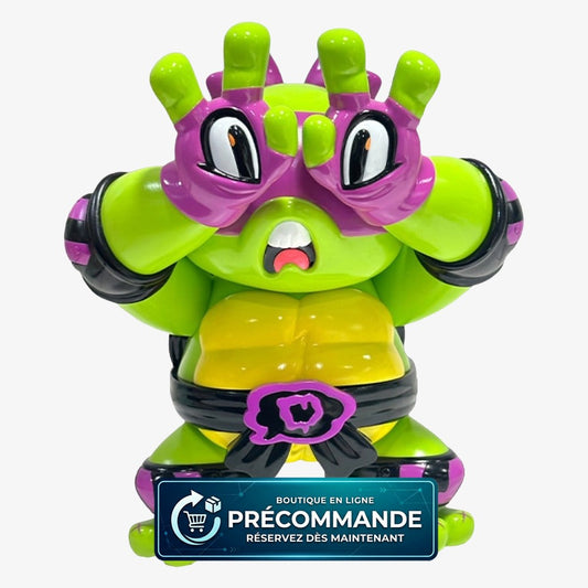 Figurine en vinyle Donatello des Tortues Ninja x Grape Brain, 24 cm, avec détails colorés et pose dynamique.