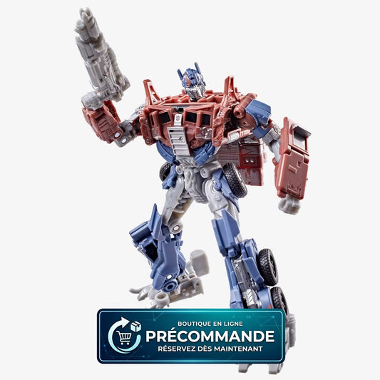 Figurine Optimus Prime Transformers Studio Series Voyager Class de l'Âge de l'extinction de Hasbro, vue de face avec masque et véhicule.
