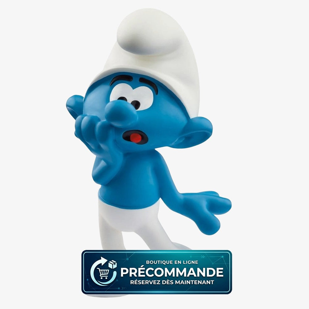 Mini-figurine Schtroumpf Peureux de 5 cm de la marque Schleich, représentant un personnage des Schtroumpfs en pose expressive.