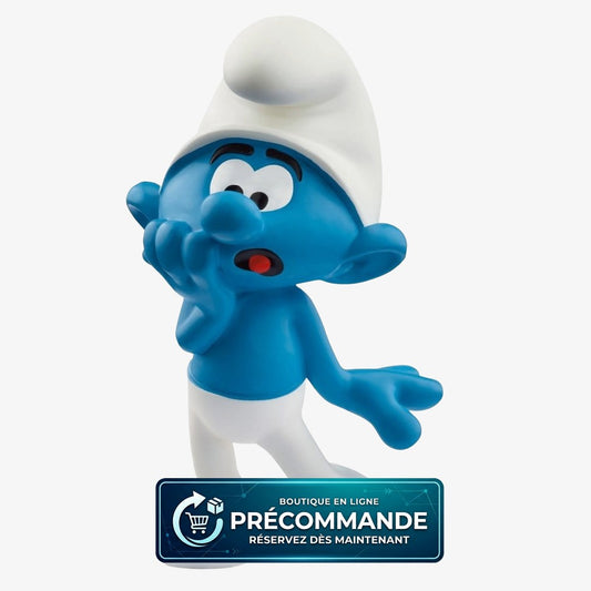 Mini-figurine Schtroumpf Peureux de 5 cm de la marque Schleich, représentant un personnage des Schtroumpfs en pose expressive.