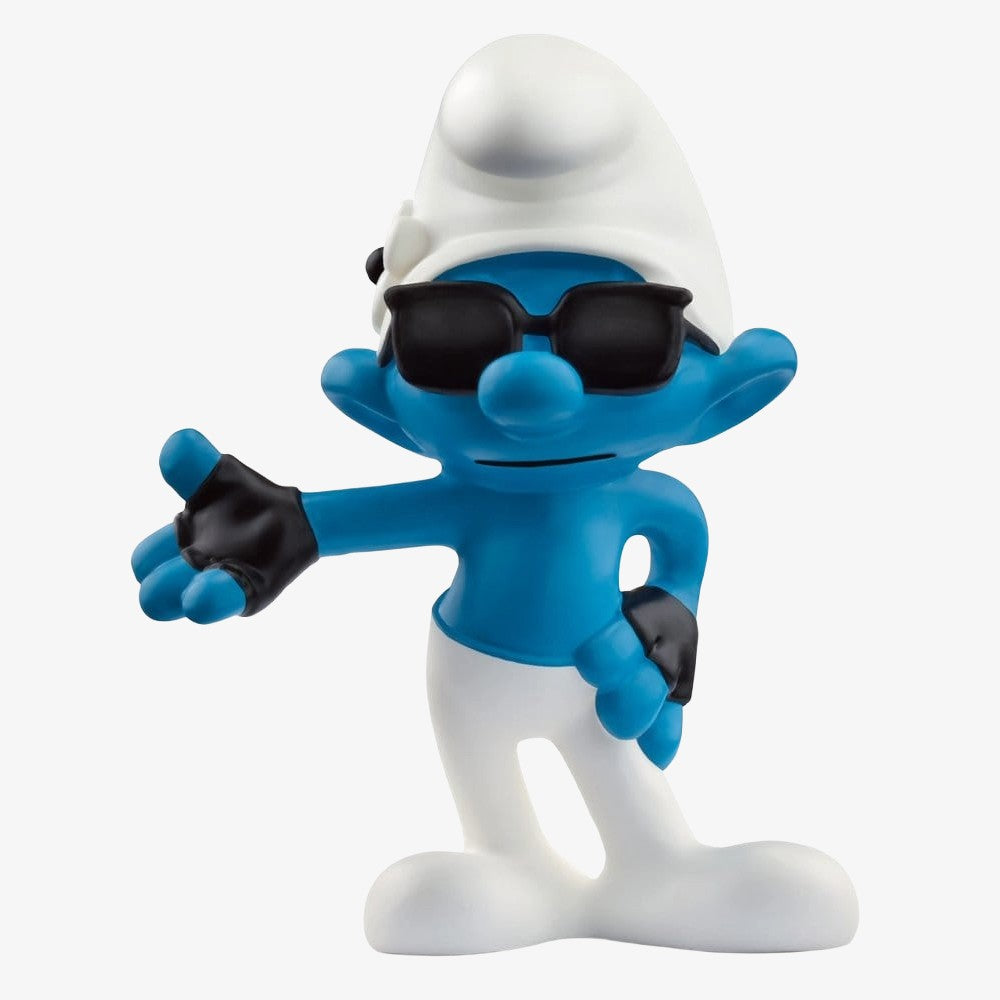 Mini-figurine Schtroumpf Vaniteux de 5 cm de la marque Schleich, représentant le personnage bleu avec des détails colorés.
