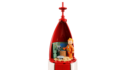 Briques de construction Lego Icons La Fusée Lunaire de Tintin, modèle détaillé inspiré de l'œuvre d'Hergé, vue de face.
