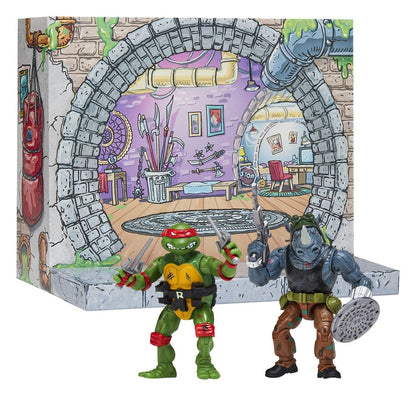 Figurines remasterisées Tortues Ninja de Playmates Toys : Raphael face à Rocksteady, figurines détaillées et colorées.