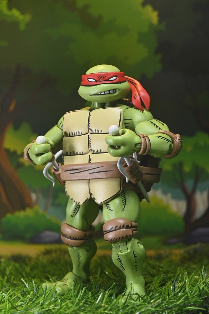 Figurine NECA Ultimate Raphael TMNT x Usagi Yojimbo, version comic, 18 cm, montrant Raphael en pose dynamique avec détails colorés