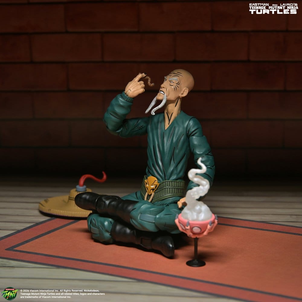 Figurine Neca des Tortues Ninja adolescentes Mirage Comics Foot Mystic Mashima de 18 cm, détail fin et pose dynamique.